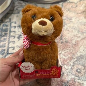 Peppermint Holiday Bear. Our Generation Brown Teddy Bear with Red Bow